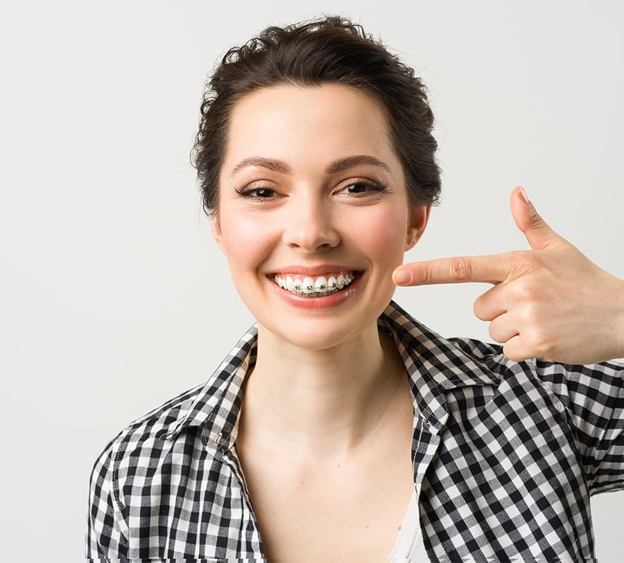 Adult braces patient smiling confidently
